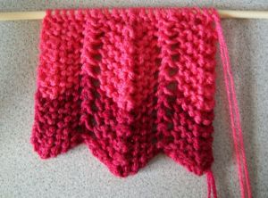 scarf on knitting needles